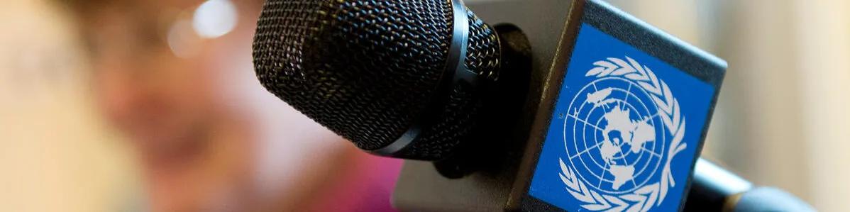 A microphone with UN logo