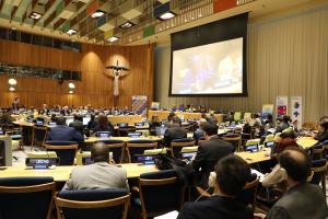 Attendees listen to speeches at the FfD Forum